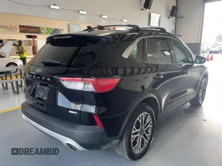2020 Ford Escape SEL z VIN 1FMCU9H69LUA59992, wystawiony jako IAAI lot #42797223 z przebiegiem 87 913 mil mil oraz . Historia ofert i sprzedaży dostępna na DreamBid. Obrazek 10.