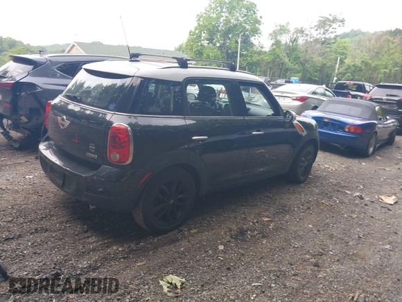 2012 MINI Countryman with VIN WMWZB3C5XCWM30191, listed as a IAAI auction lot 42435291 with 103,254 mi miles and . Bid and sale history available at DreamBid. Image 4.