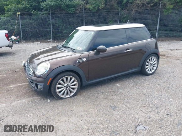 2010 MINI Hardtop with VIN WMWMF3C55ATZ23127, listed as a IAAI auction lot 42667783 with 61,954 mi miles and . Bid and sale history available at DreamBid. Image 2.