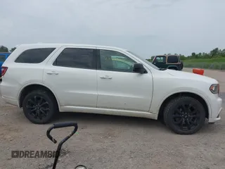 2019 Dodge Durango SXT Plus with VIN 1C4RDJAG0KC848670, listed as a IAAI auction lot 42480194 with 106,260 mi miles and . Bid and sale history available at DreamBid. Image 14.