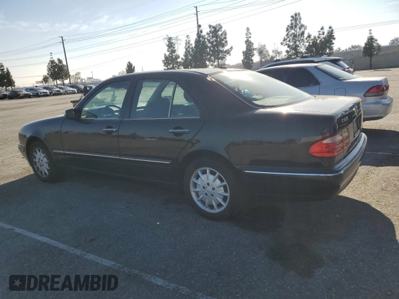 2001 Mercedes-Benz E-Class with VIN WDBJF65J21B365890, listed as a Copart auction lot 50519975 with 110,541 mi miles and Salvage Title. Bid and sale history available at carsss.com. Image 2.