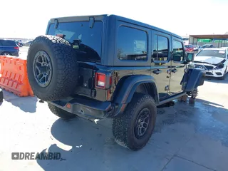 2023 Jeep Wrangler Sport S z VIN 1C4HJXDG5PW530892, wystawiony jako IAAI lot #41389577 z przebiegiem 17 014 mil mil oraz . Historia ofert i sprzedaży dostępna na DreamBid. Obrazek 4.