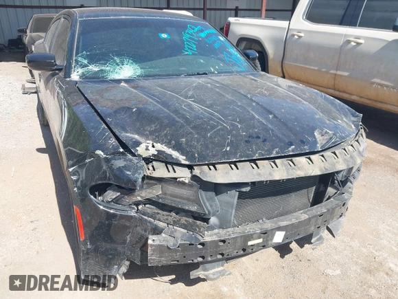 2015 Dodge Charger SXT with VIN 2C3CDXHG5FH928553, listed as a IAAI auction lot 42279342 with 129,402 mi miles and . Bid and sale history available at DreamBid. Image 6.