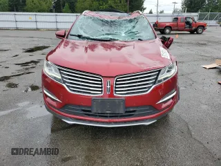2015 Lincoln MKC z VIN 5LMTJ2AHXFUJ10820, wystawiony jako Copart lot #57139315 z przebiegiem 128 714 mil mil oraz Szkody całkowita. Historia ofert i sprzedaży dostępna na DreamBid. Obrazek 5.