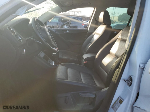2015 Volkswagen Tiguan S with VIN WVGBV7AX1FW602308, listed as a Copart auction lot 41533115 with 104,098 mi miles and Salvage Title. Bid and sale history available at carsss.com. Image 7.