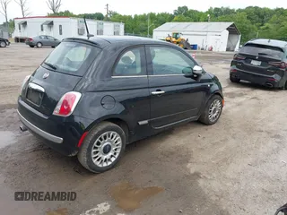 2013 FIAT 500 Lounge with VIN 3C3CFFCR8DT743107, listed as a IAAI auction lot 42381709 with 90,094 mi miles and . Bid and sale history available at DreamBid. Image 4.