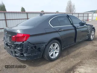 2014 BMW 5 Series 528i xDrive with VIN WBA5A7C55ED617099, listed as a IAAI auction lot 42003348 with 85,262 mi miles and . Bid and sale history available at DreamBid. Image 4.