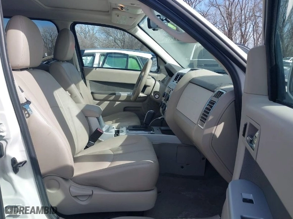 2010 Mercury Mariner Premier with VIN 4M2CN9HG3AKJ06981, listed as a IAAI auction lot 41612787 with 183,048 mi miles. Bid and sale history available at carsss.com. Image 5.