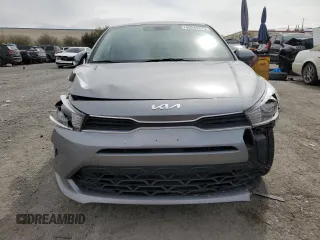 2023 Kia Rio S with VIN 3KPA24AD1PE552714, listed as a Copart auction lot 49243375 with 50,657 mi miles and Salvage Title. Bid and sale history available at carsss.com. Image 5.