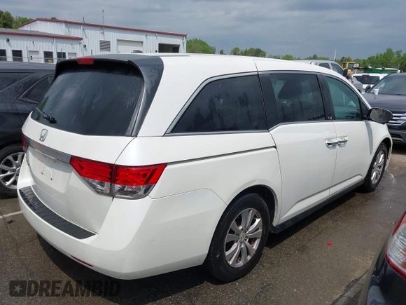 2015 Honda Odyssey EX-L with VIN 5FNRL5H6XFB003972, listed as a IAAI auction lot 41998663 with 171,554 mi miles and . Bid and sale history available at DreamBid. Image 4.