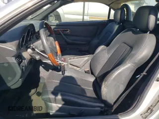 2001 Mercedes-Benz SLK-Class with VIN WDBKK65F11F178256, listed as a Copart auction lot 54979975 with 95,439 mi miles and Salvage Title. Bid and sale history available at carsss.com. Image 7.