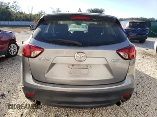 2014 Mazda CX-5 Sport with VIN JM3KE2BE1E0332932, listed as a Copart auction lot 42690515 with 93,420 mi miles and Clean Title. Bid and sale history available at carsss.com. Image 6.