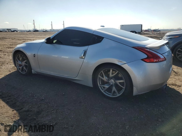 2015 Nissan 370Z Sport with VIN JN1AZ4EH9FM444241, listed as a Copart auction lot 46667685 with 143,763 mi miles and Clean Title. Bid and sale history available at carsss.com. Image 2.