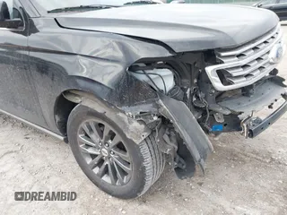 2021 Ford Expedition Max Limited with VIN 1FMJK1KT8MEA39760, listed as a IAAI auction lot 41699513 with 125,894 mi miles and . Bid and sale history available at DreamBid. Image 18.
