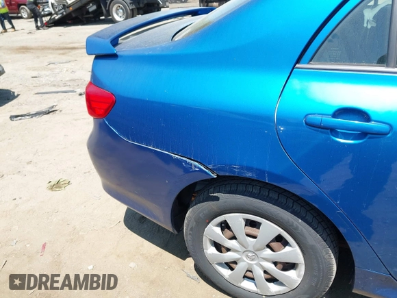 2009 Toyota Corolla with VIN JTDBL40E09J034871, listed as a IAAI auction lot 42402215 with 166,742 mi miles and . Bid and sale history available at DreamBid. Image 14.