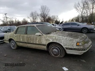 1989 Oldsmobile Cutlass z VIN 1G3AM51W0KG347458, wystawiony jako Copart lot #86949074 z przebiegiem 30 169 mil mil oraz Tytuł czysty. Historia ofert i sprzedaży dostępna na DreamBid. Obrazek 4.