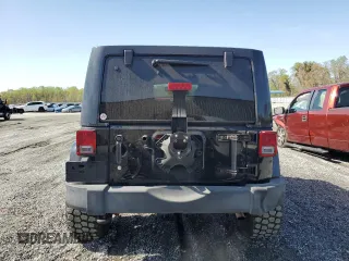 2016 Jeep Wrangler Unlimited Rubicon with VIN 1C4BJWFG8GL226020, listed as a Copart auction lot 51225955 with 103,770 mi miles and Clean Title. Bid and sale history available at carsss.com. Image 6.
