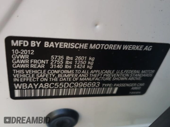 2013 BMW 7 Series 750i with VIN WBAYA8C55DC996693, listed as a Copart auction lot 80233423 with 140,925 mi miles and Salvage Title. Bid and sale history available at DreamBid. Image 13.