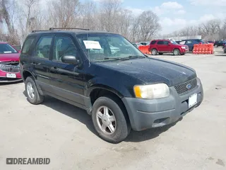 2003 Ford Escape XLS Popular with VIN 1FMYU02153KB46301, listed as a IAAI auction lot 41793418 with 188,184 mi miles. Bid and sale history available at carsss.com. Image 1.