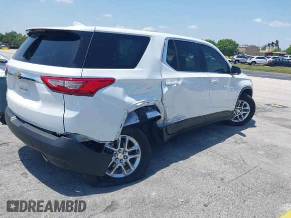 2021 Chevrolet Traverse LS with VIN 1GNERFKWXMJ201136, listed as a IAAI auction lot 42254422 with 50,663 mi miles and . Bid and sale history available at DreamBid. Image 4.