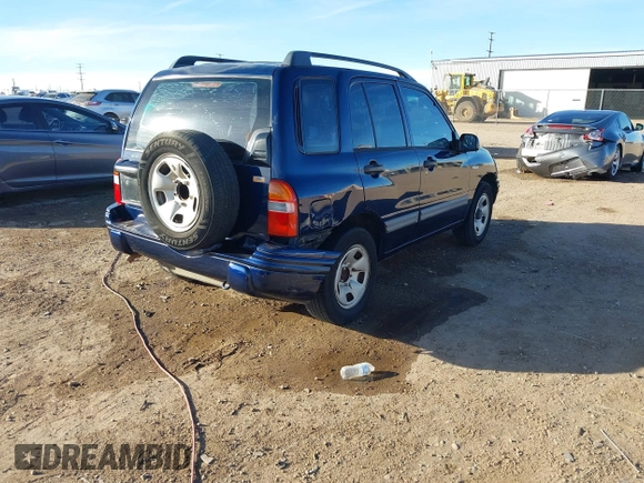 2003 Suzuki Vitara z VIN 2S3TE52V436101091, wystawiony jako IAAI lot #41472279 z przebiegiem 163 429 mil mil oraz . Historia ofert i sprzedaży dostępna na DreamBid. Obrazek 4.