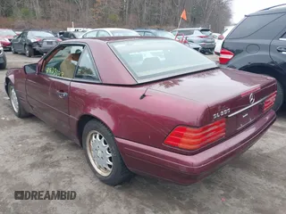 1997 Mercedes-Benz SL-Class with VIN WDBFA67F3VF142320, listed as a IAAI auction lot 41835593 with 172,151 mi miles. Bid and sale history available at carsss.com. Image 3.