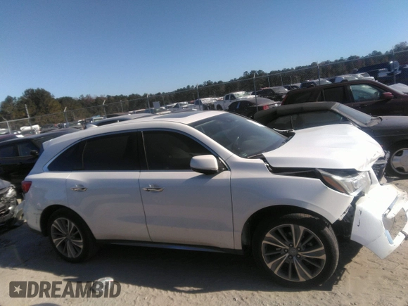 2018 Acura MDX w/Technology Pkg with VIN 5J8YD4H57JL016650, listed as a IAAI auction lot 40979704 with 82,980 mi miles. Bid and sale history available at carsss.com. Image 13.