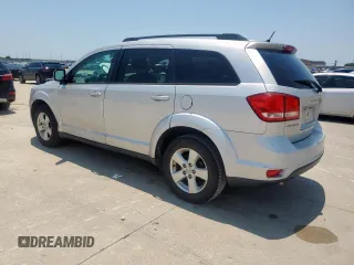 2012 Dodge Journey SXT with VIN 3C4PDCBG1CT134375, listed as a Copart auction lot 61059305 with 165,913 mi miles and Salvage title. Bid and sale history available at DreamBid. Image 2.