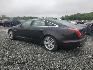 2017 Jaguar XJ Portfolio z VIN SAJWJ2GD3H8W10775, wystawiony jako Copart lot #59276325 z przebiegiem 90 345 mil mil oraz Szkoda całkowita • Salvage title. Historia ofert i sprzedaży dostępna na DreamBid. Obrazek 2.