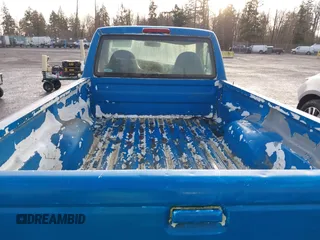 1999 Ford Ranger XL with VIN 1FTYR10V7XPB93324, listed as a IAAI auction lot 41762585 with 214,904 mi miles. Bid and sale history available at carsss.com. Image 8.