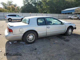 1997 Mercury Cougar z VIN 1MELM6245VH627028, wystawiony jako Copart lot #65533884 z przebiegiem 74 360 mil mil oraz Szkody całkowita. Historia ofert i sprzedaży dostępna na DreamBid. Obrazek 3.