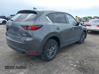 2021 Mazda CX-5 Touring with VIN JM3KFACM1M0461510, listed as a IAAI auction lot 41660439 with 30,352 mi miles. Bid and sale history available at carsss.com. Image 4.
