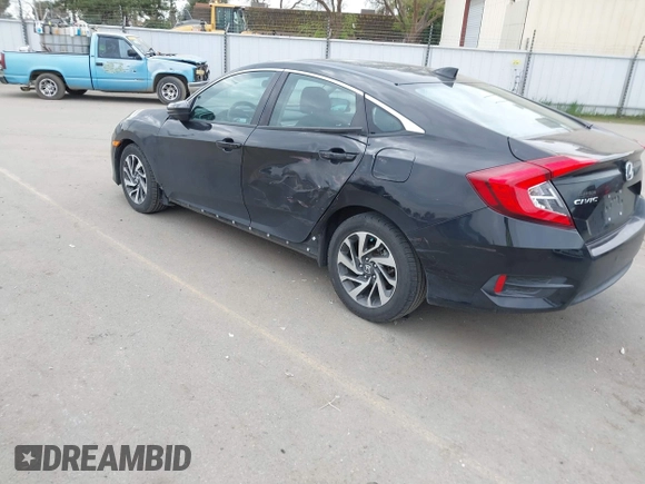 2018 Honda Civic EX with VIN 2HGFC2F75JH583892, listed as a IAAI auction lot 41697605 with 134,675 mi miles and . Bid and sale history available at DreamBid. Image 3.