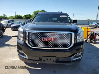 2015 GMC Yukon Denali z VIN 1GKS1CKJ8FR748131, wystawiony jako Copart lot #55213205 z przebiegiem 101 758 mil mil oraz Szkoda całkowita • Salvage title. Historia ofert i sprzedaży dostępna na DreamBid. Obrazek 5.