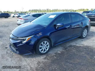 2024 Toyota Corolla Hybrid LE with VIN JTDBCMFE4RJ021466, listed as a IAAI auction lot 41976149 with 21,965 mi miles. Bid and sale history available at carsss.com. Image 2.