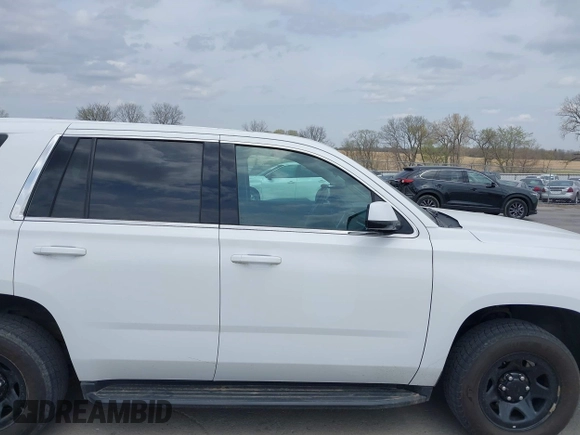 2020 Chevrolet Tahoe Commercial z VIN 1GNSKDEC9LR260983, wystawiony jako IAAI lot #42062097 z przebiegiem 124 911 mil mil oraz . Historia ofert i sprzedaży dostępna na DreamBid. Obrazek 13.