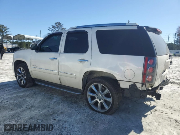 2014 GMC Yukon Denali with VIN 1GKS2EEF0ER130588, listed as a Copart auction lot 45232075 with 193,677 mi miles and Salvage Title. Bid and sale history available at carsss.com. Image 2.