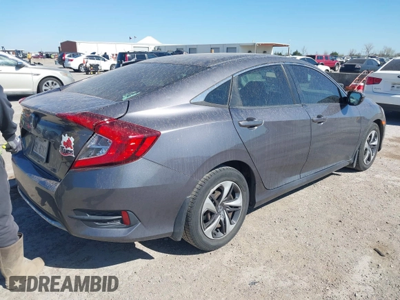 2019 Honda Civic Sedan LX with VIN 19XFC2F64KE005270, listed as a IAAI auction lot 41852238 with 106,604 mi miles. Bid and sale history available at carsss.com. Image 4.