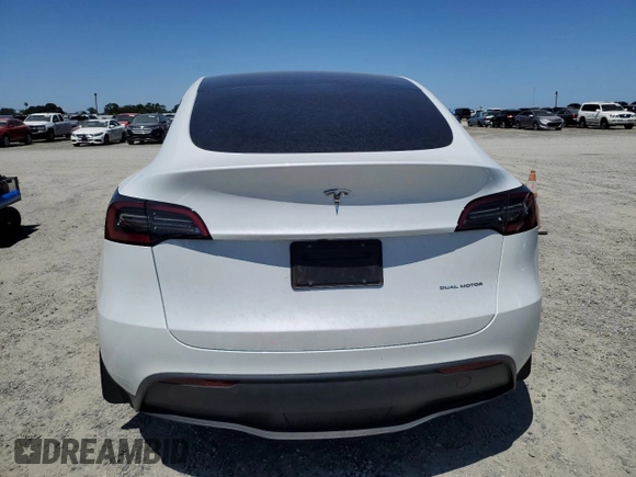 2024 Tesla Model Y Long Range with VIN 7SAYGDEE4RF054753, listed as a Copart auction lot 57989375 with 21,394 mi miles and Salvage title. Bid and sale history available at DreamBid. Image 6.