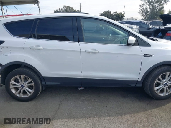 2017 Ford Escape SE z VIN 1FMCU0GD9HUD20265, wystawiony jako IAAI lot #41389092 z przebiegiem 66 778 mil mil oraz . Historia ofert i sprzedaży dostępna na DreamBid. Obrazek 14.