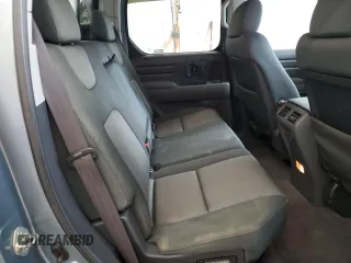 2007 Honda Ridgeline RTS z VIN 2HJYK16467H514031, wystawiony jako Copart lot #57571865 z przebiegiem 298 895 mil mil oraz Szkoda całkowita • Salvage title. Historia ofert i sprzedaży dostępna na DreamBid. Obrazek 10.