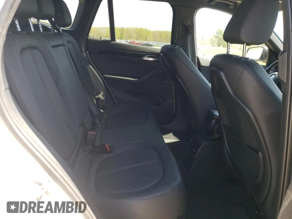 2019 BMW X1 xDrive28i with VIN WBXHT3C51K3H35953, listed as a Copart auction lot 54751675 with 54,802 mi miles and Salvage title. Bid and sale history available at DreamBid. Image 11.