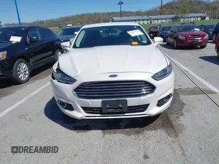2014 Ford Fusion SE with VIN 3FA6P0HD3ER227077, listed as a IAAI auction lot 42007792 with 82,866 mi miles and . Bid and sale history available at DreamBid. Image 12.