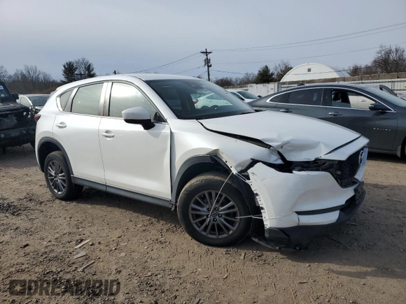 2018 Mazda CX-5 Sport with VIN JM3KFBBM3J0412294, listed as a Copart auction lot 45681805 with 82,458 mi miles and Salvage Title. Bid and sale history available at carsss.com. Image 4.