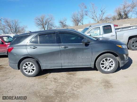 2020 Chevrolet Equinox LT with VIN 2GNAXUEV4L6251604, listed as a IAAI auction lot 41695518 with 61,908 mi miles. Bid and sale history available at carsss.com. Image 13.