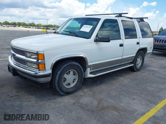 1995 Chevrolet Tahoe with VIN 1GNEC13K9SJ414611, listed as a IAAI auction lot 42798752 with 205,988 mi miles and . Bid and sale history available at DreamBid. Image 2.