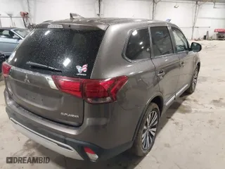 2019 Mitsubishi Outlander ES with VIN JA4AZ3A34KZ020667, listed as a IAAI auction lot 41828628 with 99,667 mi miles. Bid and sale history available at carsss.com. Image 4.