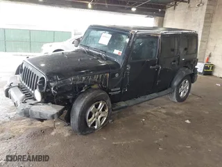 2015 Jeep Wrangler Unlimited Willys Wheeler with VIN 1C4BJWDG9FL652607, listed as a IAAI auction lot 41836193 with 166,152 mi miles. Bid and sale history available at carsss.com. Image 2.