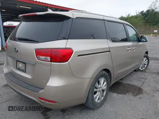 2016 Kia Sedona LX with VIN KNDMB5C16G6116730, listed as a IAAI auction lot 40953112 with 147,191 mi miles. Bid and sale history available at carsss.com. Image 4.