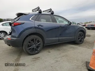 2022 Mazda CX-30 Premium with VIN 3MVDMBDY1NM446064, listed as a Copart auction lot 46527505 with 20,742 mi miles and Salvage Title. Bid and sale history available at DreamBid. Image 3.